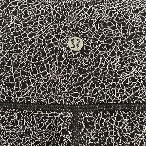 LULULEMON yoga pants capris. Size US 10. Black and white pattern.